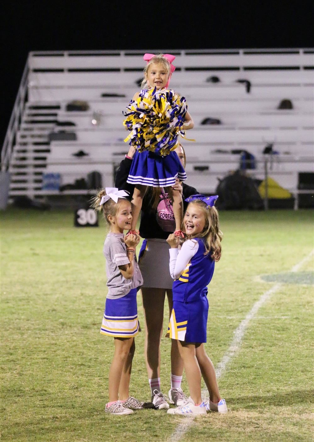 Little Girl Cheer Stunt